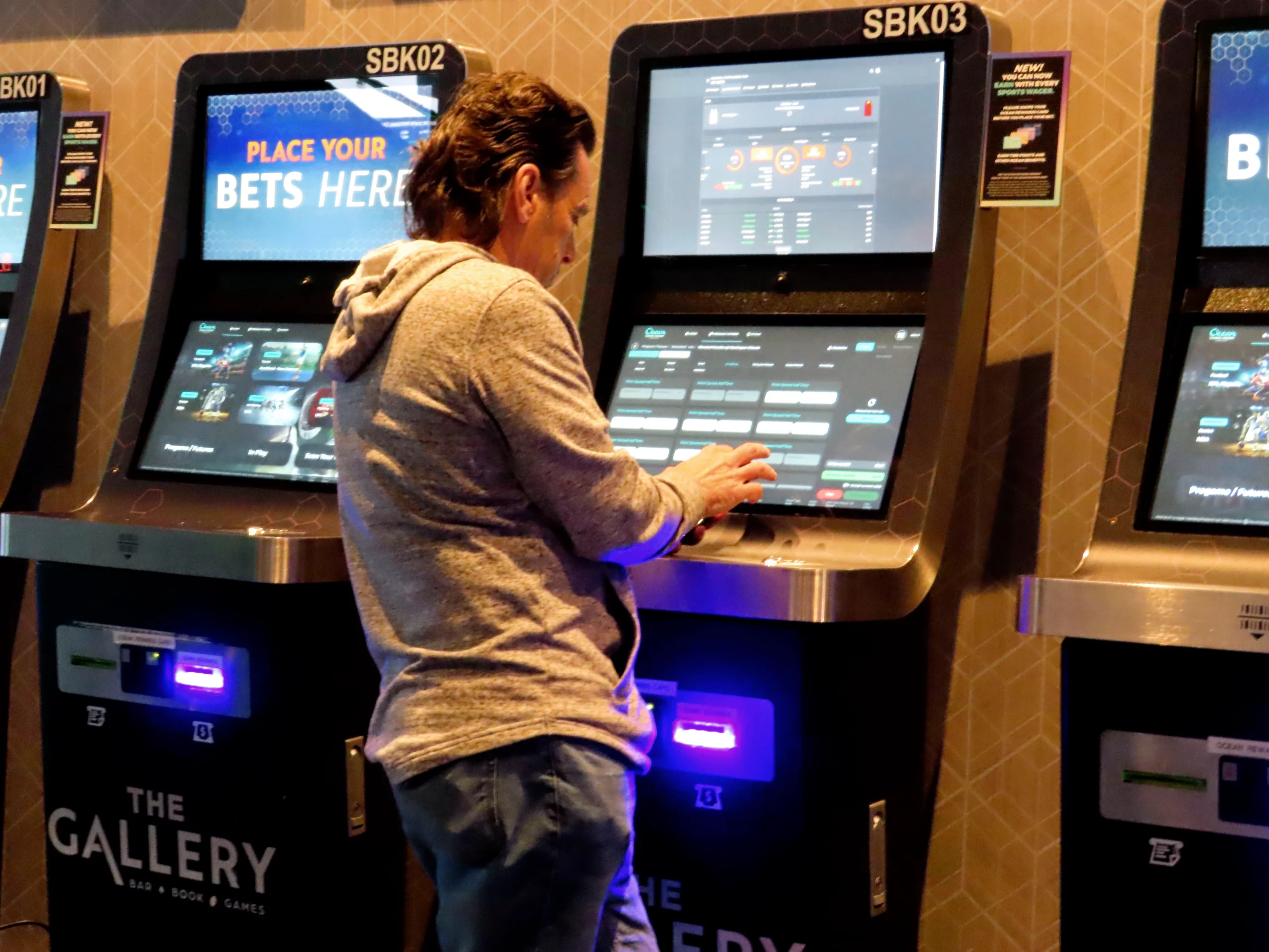 man performing online gambling activity